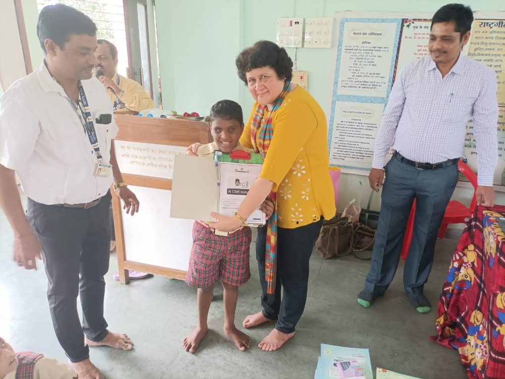 Donation of 250 workbooks to a Government School in Raigad