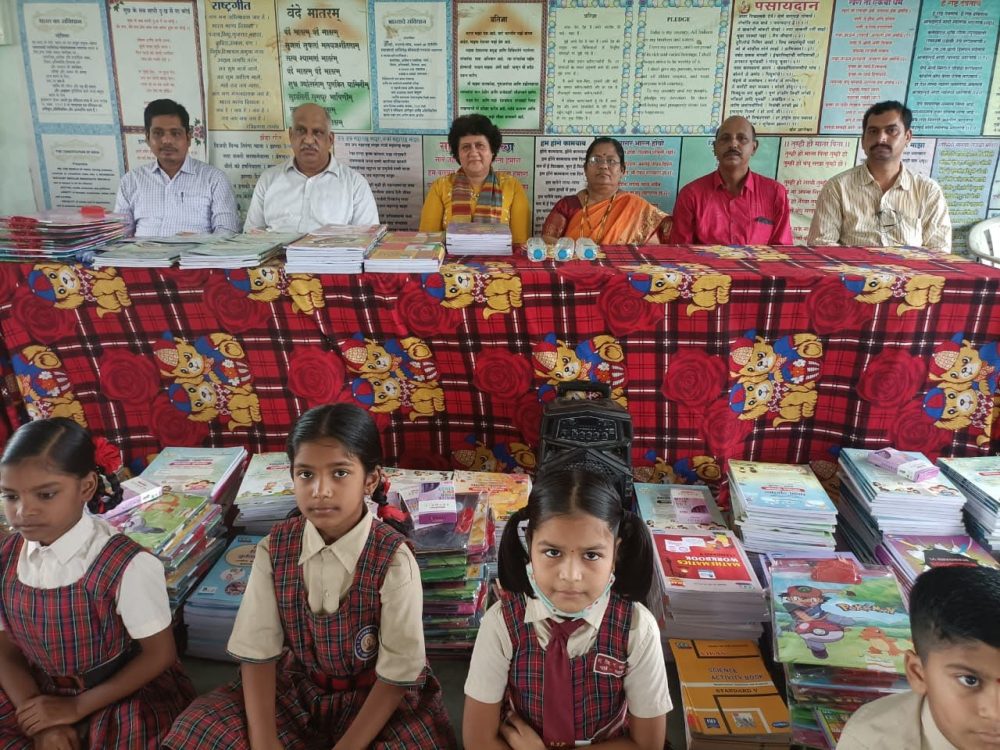 Donation of 250 workbooks to a Government School in Raigad